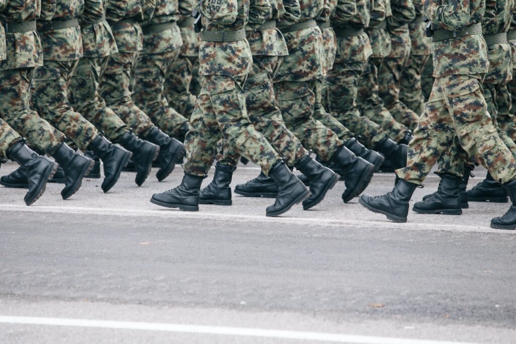 army people marching in uniforms