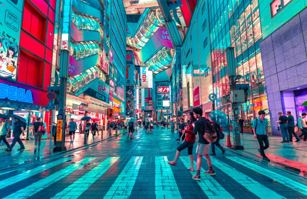 A picture of downtown tokyo with people walking along the street. Skillnote SAP Cloud