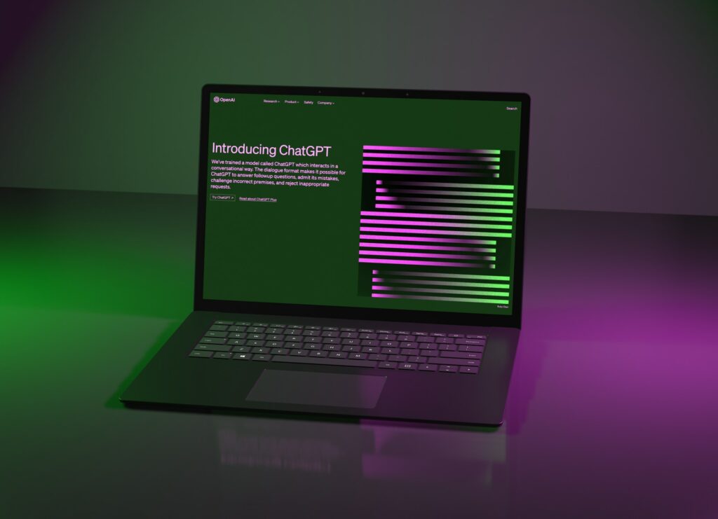 laptop with green and purple background, on laptop screen is ChatGPT information. | ChatGPT Enterprise