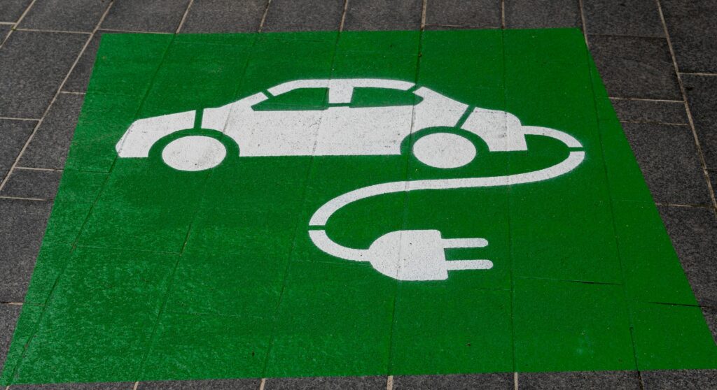 image of green electric vehicle charging point | electric vehicles