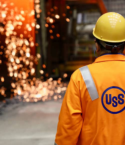 A man working in front of steel being cast in fire : U.S. Steel