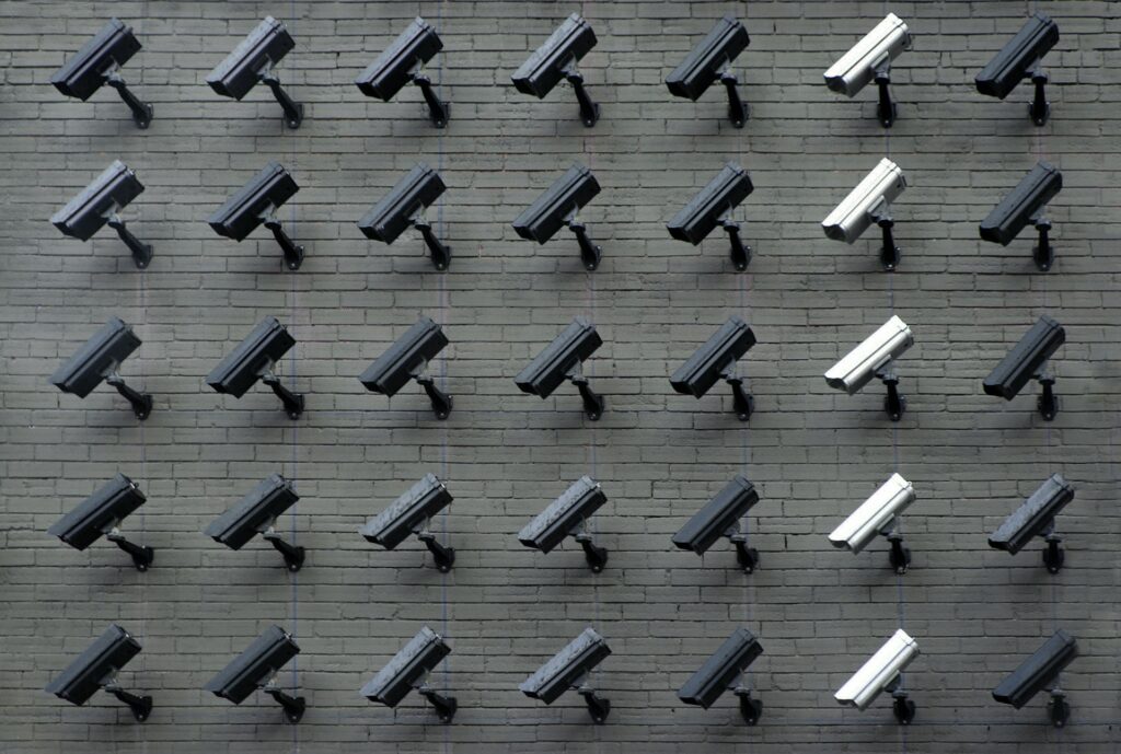 image of black and white surveillance cameras | IBM