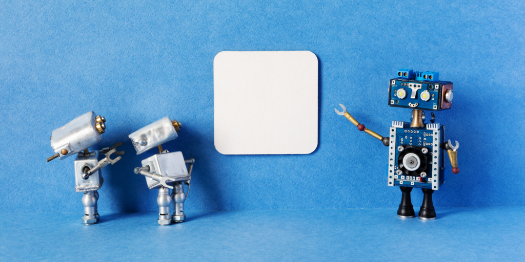 A robotic character pointing to a board as two smaller robotic characters look towards it | AI and robotic process automation