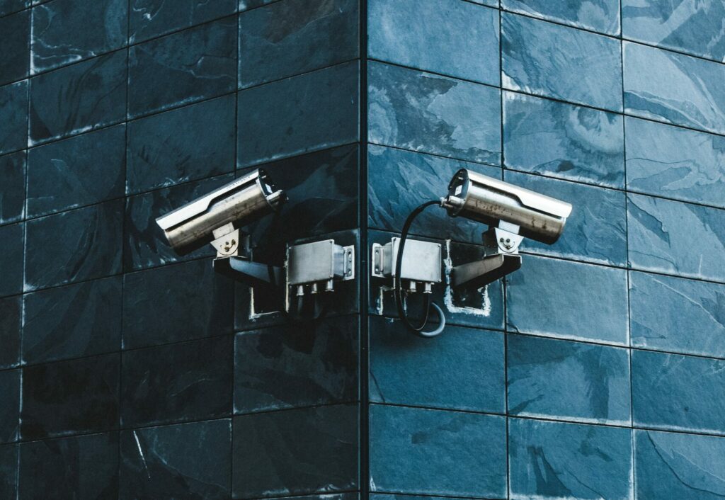 image of security camera on wall | Snowflake and J.P. Morgan
