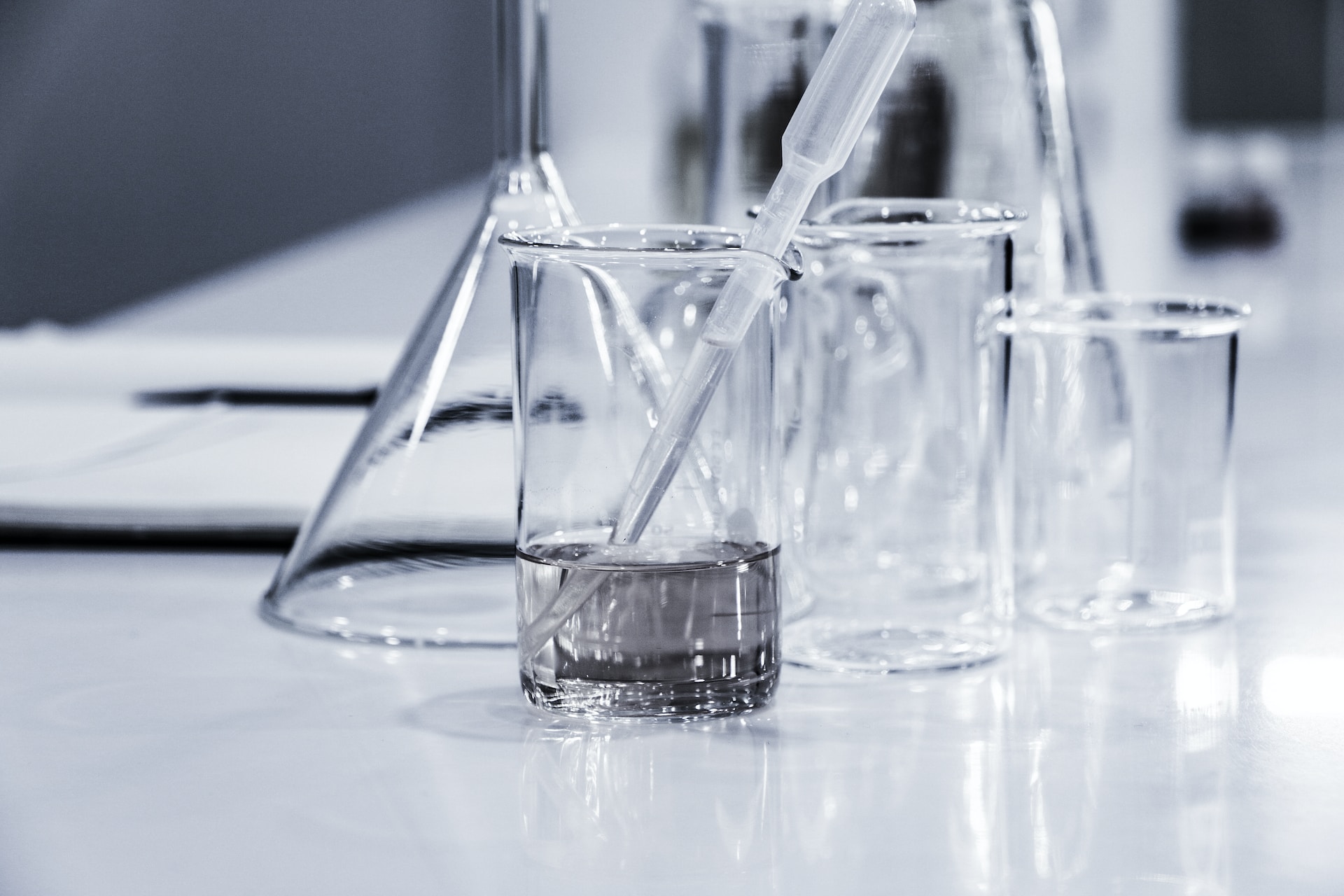 images of three clear science beakers on a table | STEM