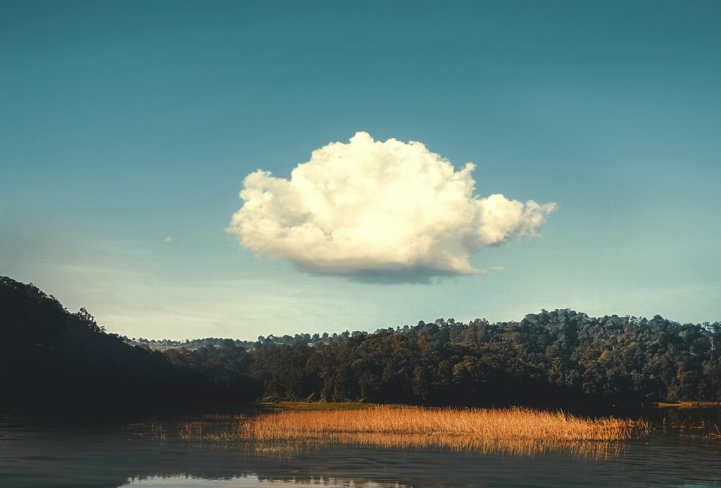 image of cloud over lake with blue skies and trees in background | Palo Alto Networks