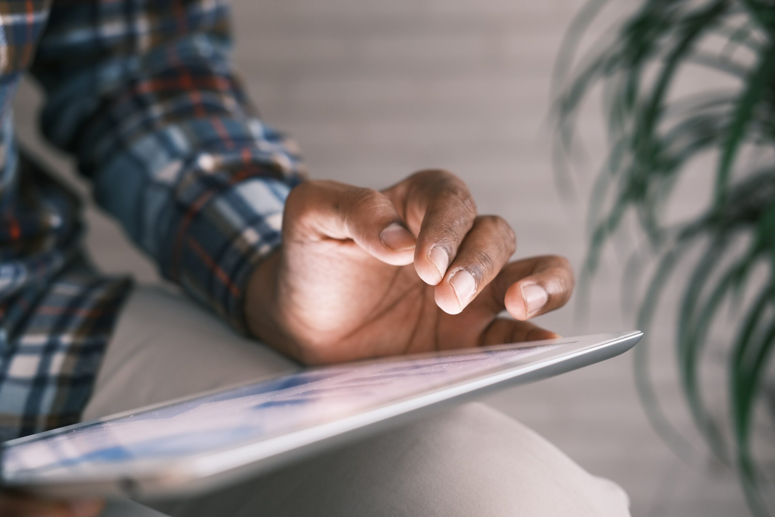 A person using a tablet device | Thomson Reuters