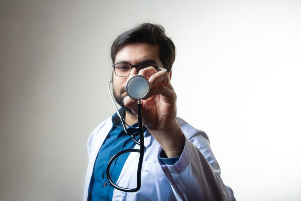 image of a healthcare professional holding stethoscope up to the camera | Vertex AI