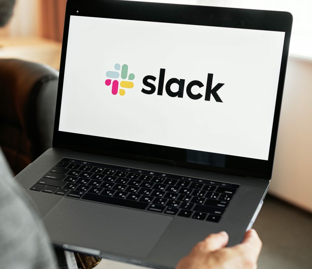 The slack logo appears on a laptop screen | Slack CEO