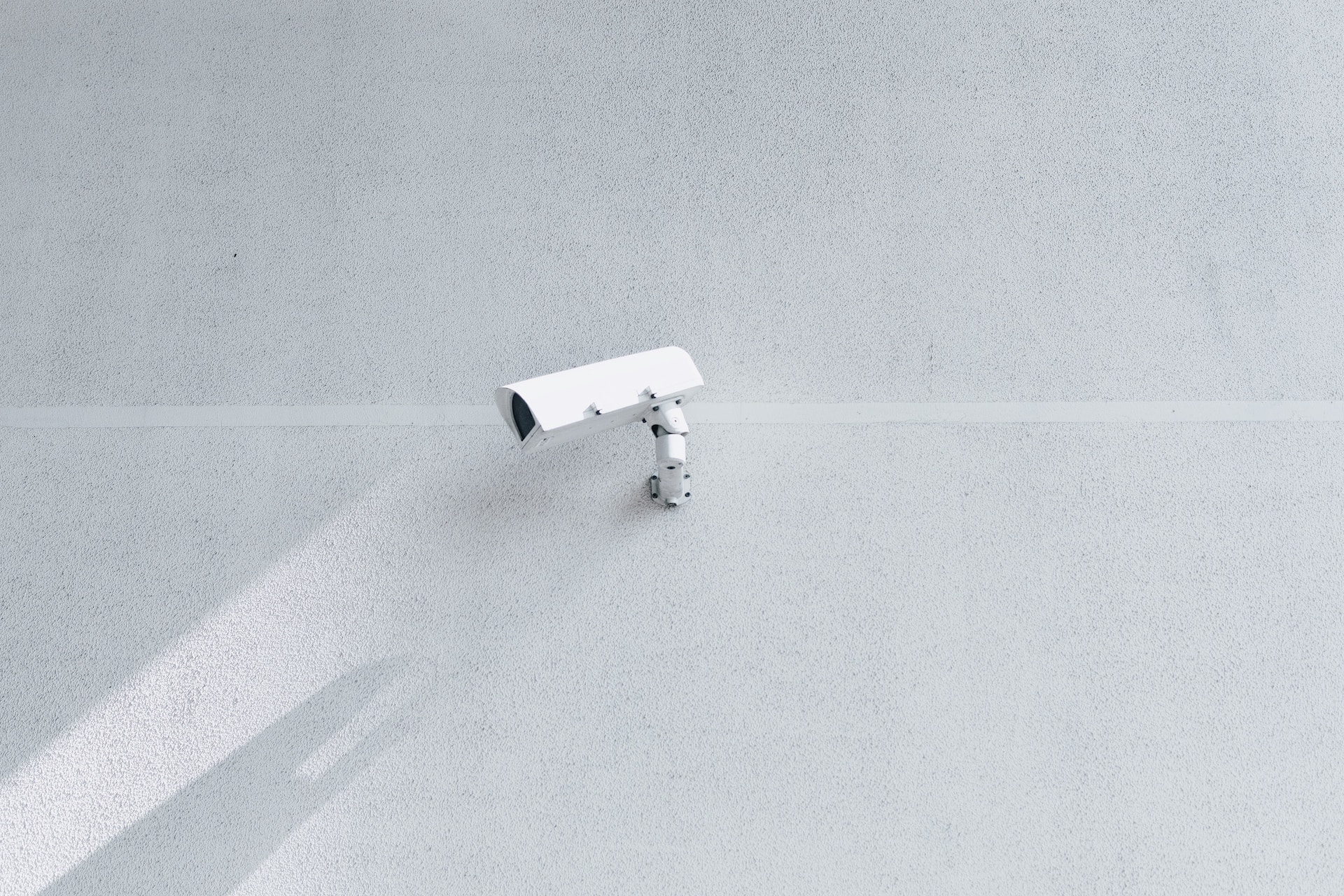 image of security camera | EY and BlueVoyant