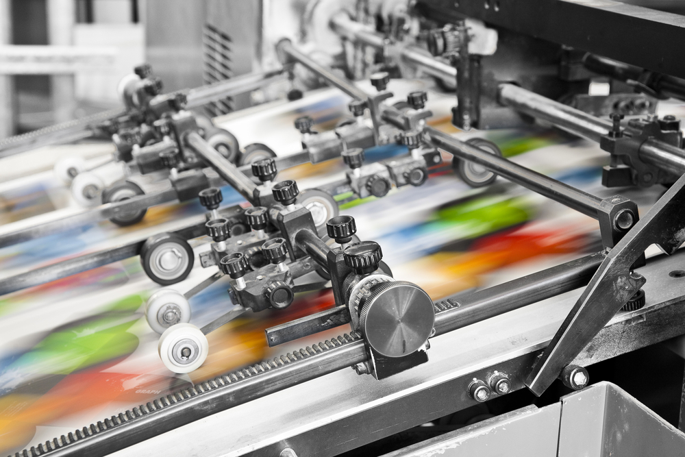 A printing machine | Basis Technologies