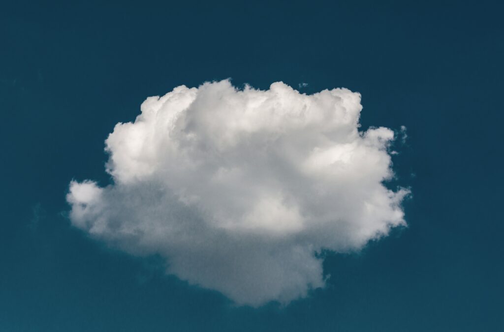 A singular cloud floating in the sky | Avvale