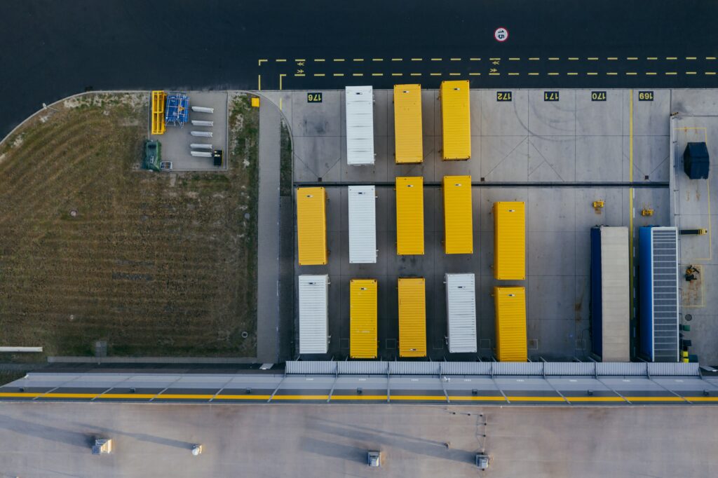 A top down view of a lorry distribution centre | composable ERP solutions Infor