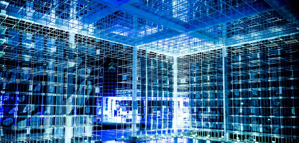 a room full of slightly suspended glass squares, all connected in a rectangular pattern | modern data warehouse SNP