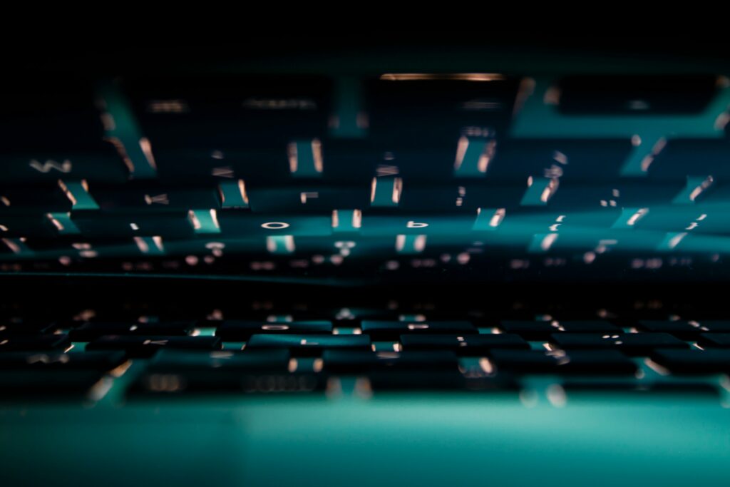 Abstract image of a black, reflected keyboard that's slightly blurry | Unifii ServiceNow