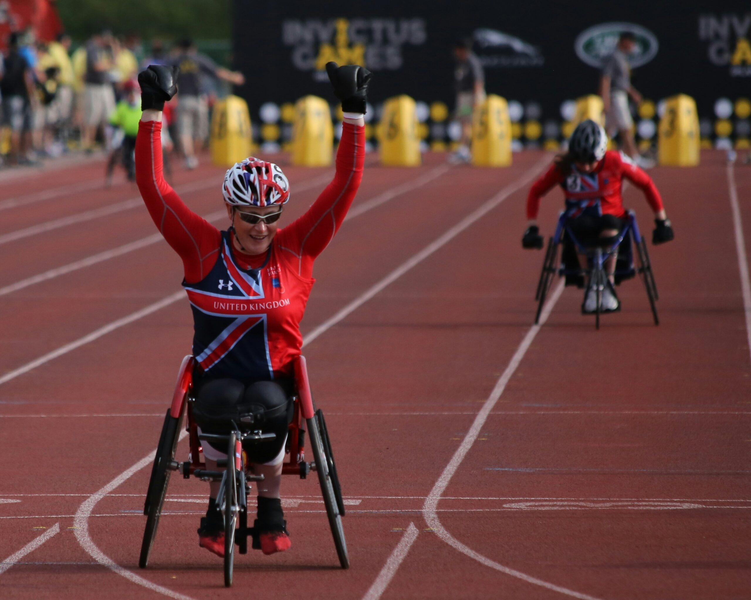 photo of two UK Paralympian athletes on a race in wheelchairs | Deloitte and ParalympicsGB digital experience