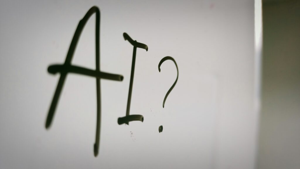 the word "AI?" written on a whiteboard | generative AI