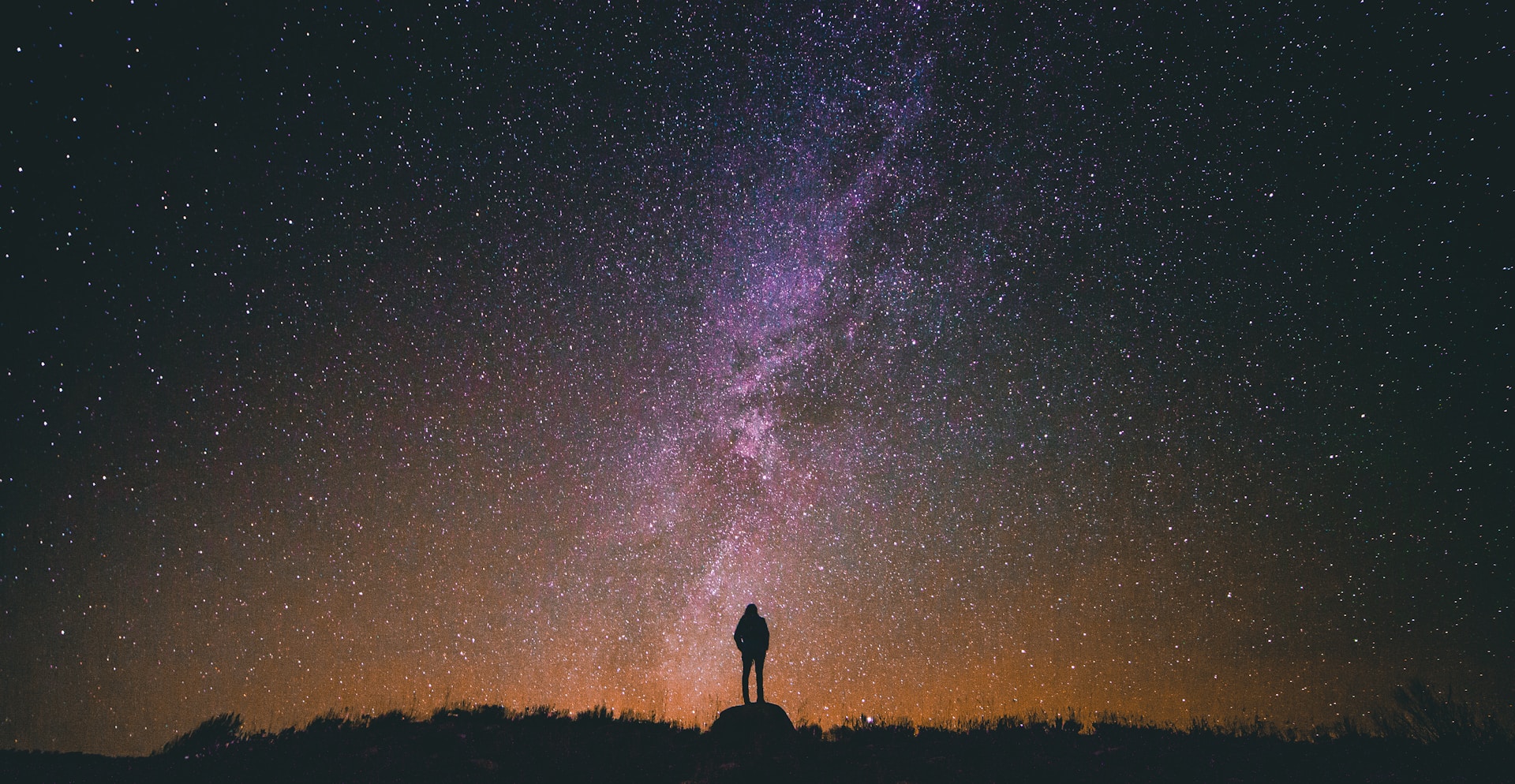 image of person gazing at the starry night sky | Microsoft Dynamics 365 Sales