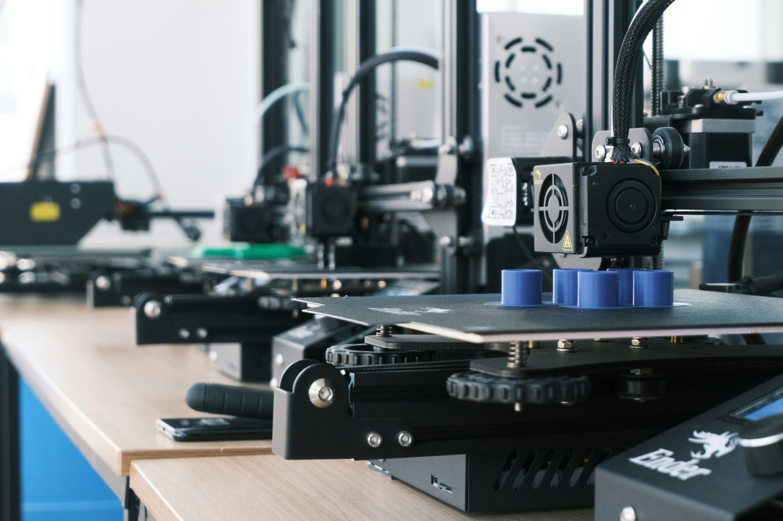 A set of FDM 3d printers in a production line | planning Global Shop Solutions