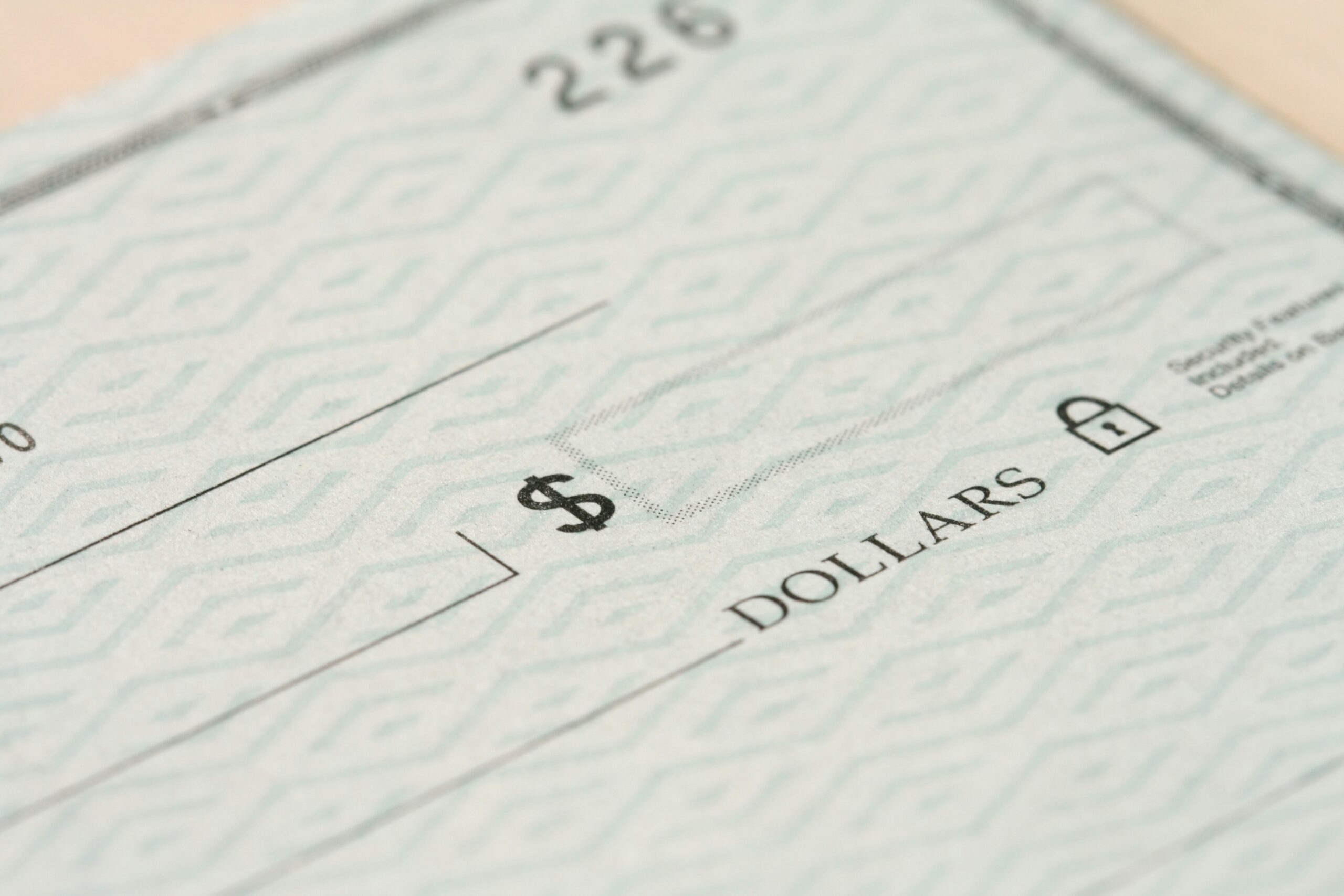 photo of a dollar cheque | CloudRock consulting services and practice for global payroll implementations