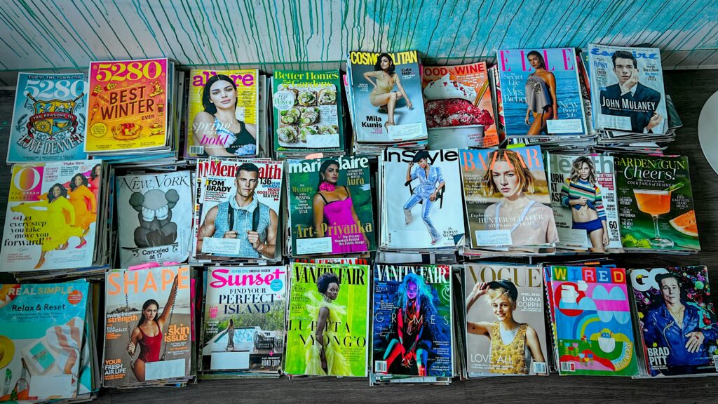 A collection of different magazines | Spinnaker Support subscription model