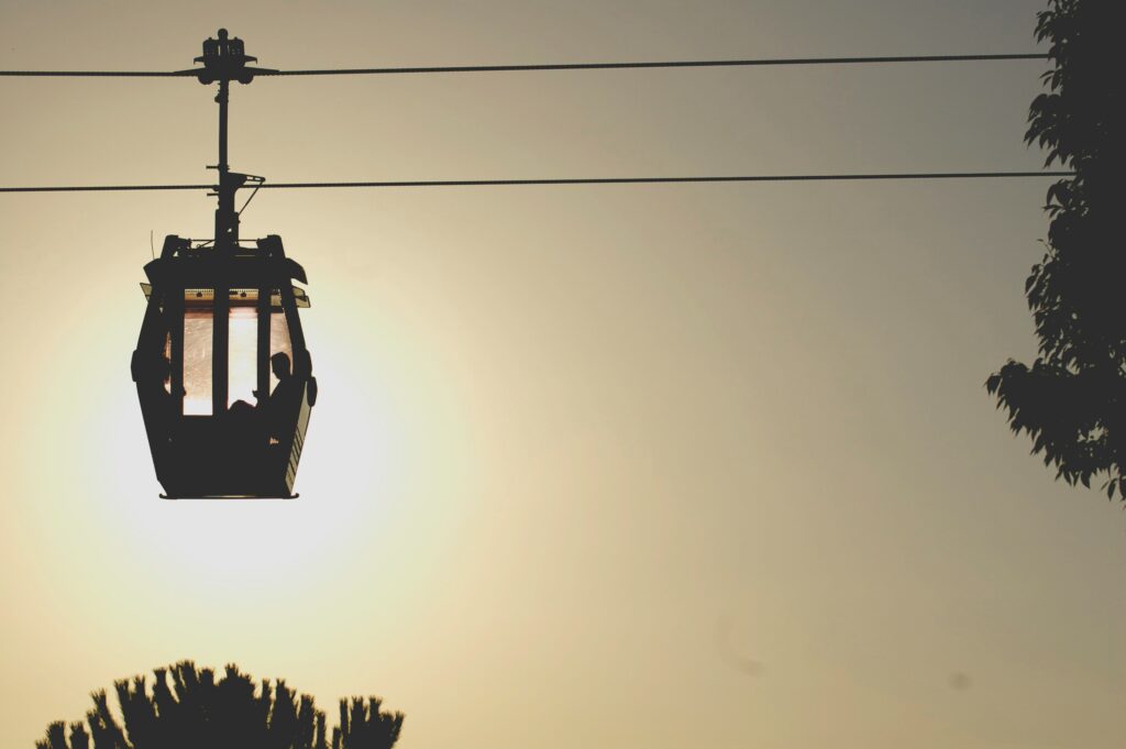 a photo of a cable car during sunset | IFS Cloud and Doppelmayr collaboration