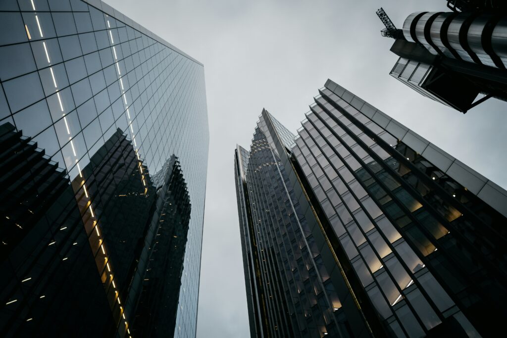 low angle photo of high-rise buildings in London | NewRocket appointment of new CEO