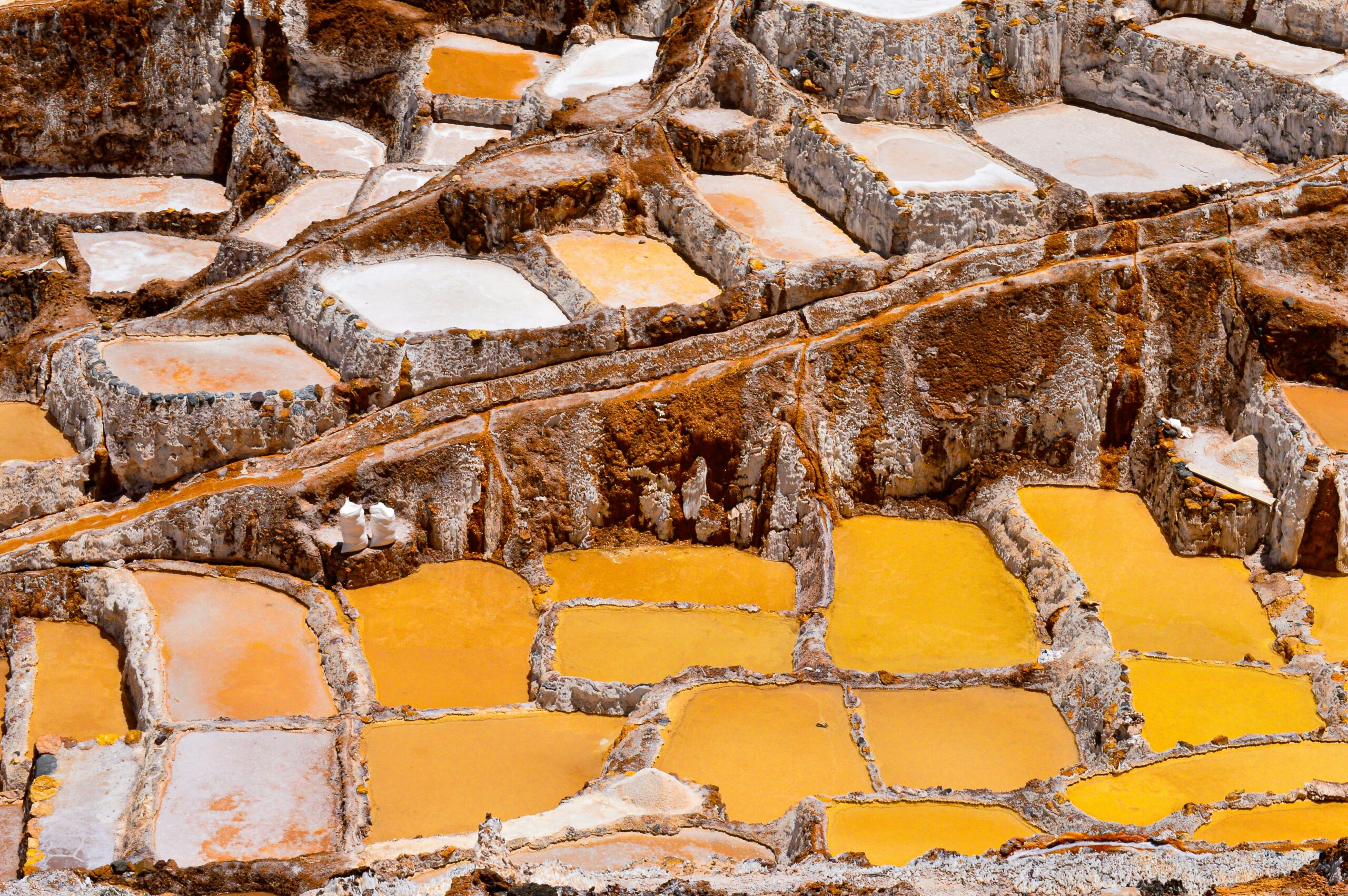 a salt mining site in yellow and orange colours | Atlas Salt digs into Oracle Cloud for efficiency and financial management