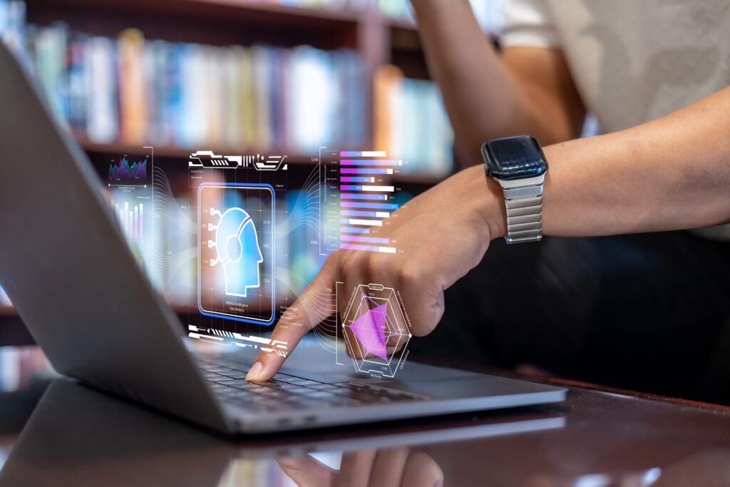 Business user interacting with AI-powered analytics on a laptop, illustrating enterprise AI and real-time data intelligence.