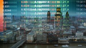 Financial data and stock figures overlaid on a city banking district skyline at dusk.