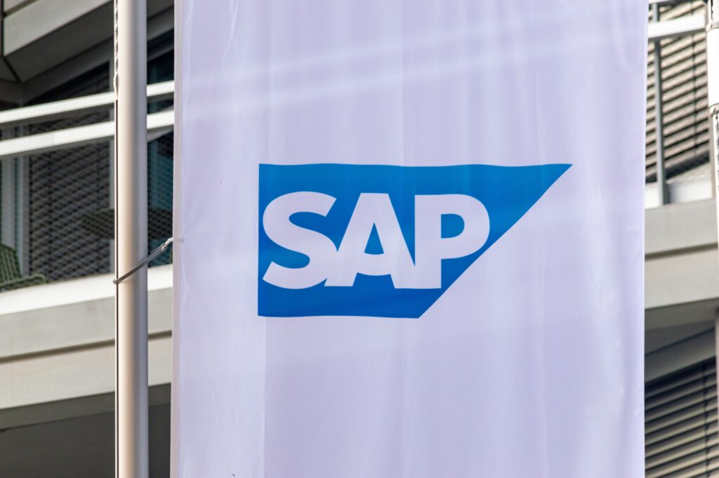 SAP logo displayed on a vertical banner outside an office building