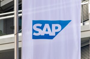 SAP logo displayed on a vertical banner outside an office building