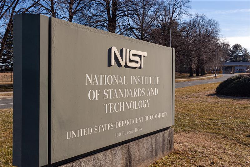 Sign at the National Institute of Standards and Technology (NIST) campus, highlighting the agency behind CVE and NVD vulnerability standards.
