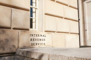 Internal Revenue Service building exterior illustrating IRS impersonation scams and tax season fraud risks in 2026.