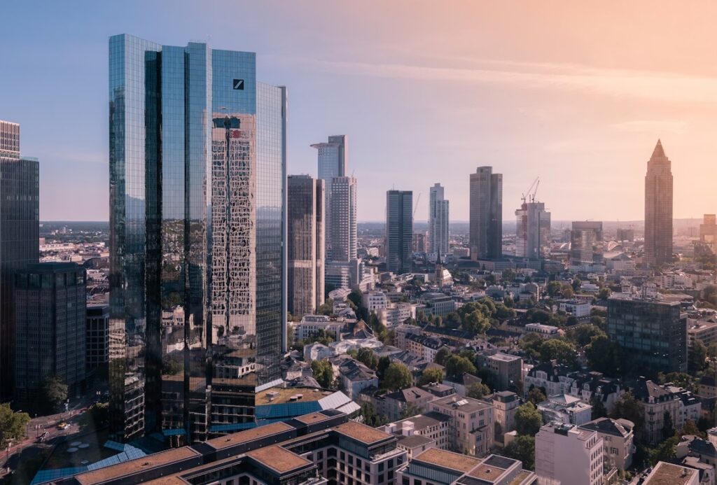 Frankfurt business district skyline representing enterprise finance systems, data infrastructure, and AI-driven collections workflows in Europe.
