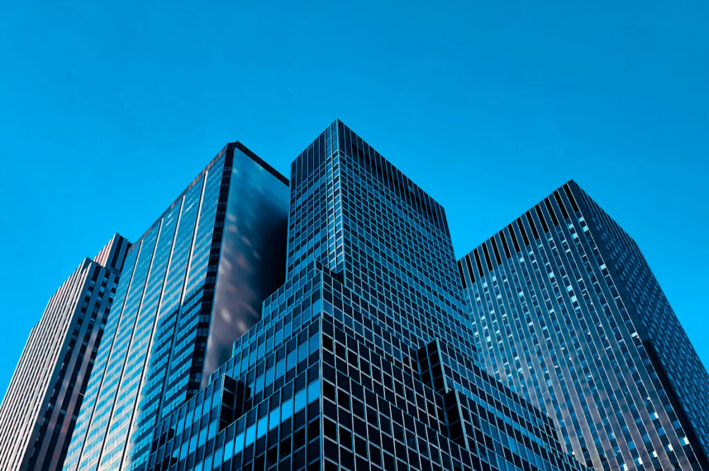 Modern office buildings representing ERP accounts payable integration and embedded payment workflows