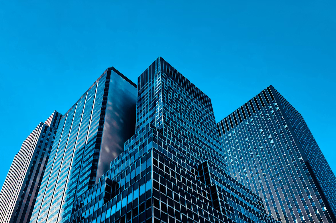 Modern office buildings representing ERP accounts payable integration and embedded payment workflows