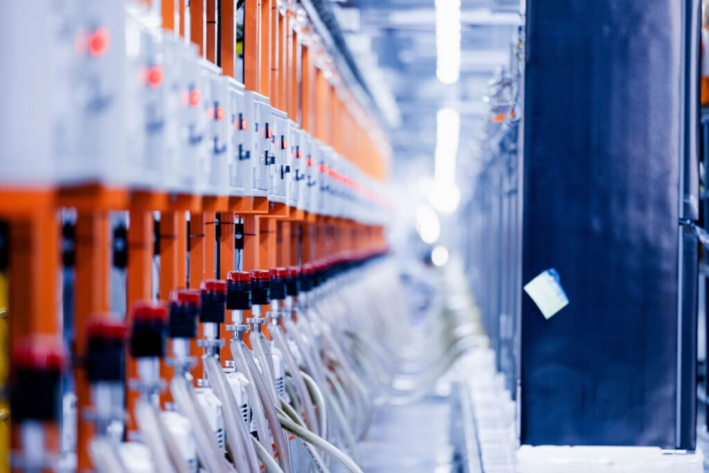 Automated manufacturing equipment illustrating SAP MII vulnerabilities highlighted in SAP Security Patch Day August 2026.