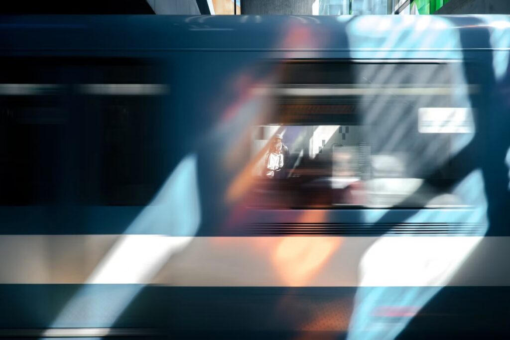 Blurred train in motion illustrating the accelerating pace of AI cyber risk and enterprise security threats.