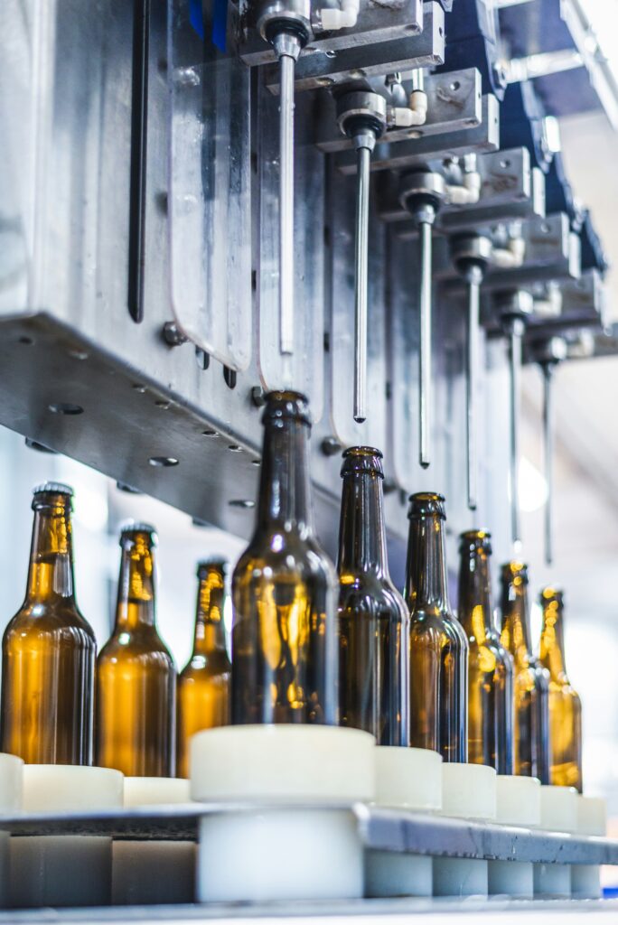 automated bottling line at a manufacturing facility.